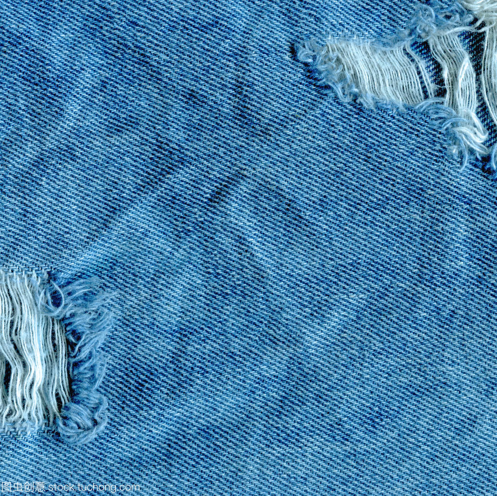 粗斜纹棉布牛仔裤的撕裂美学与纹理魅力